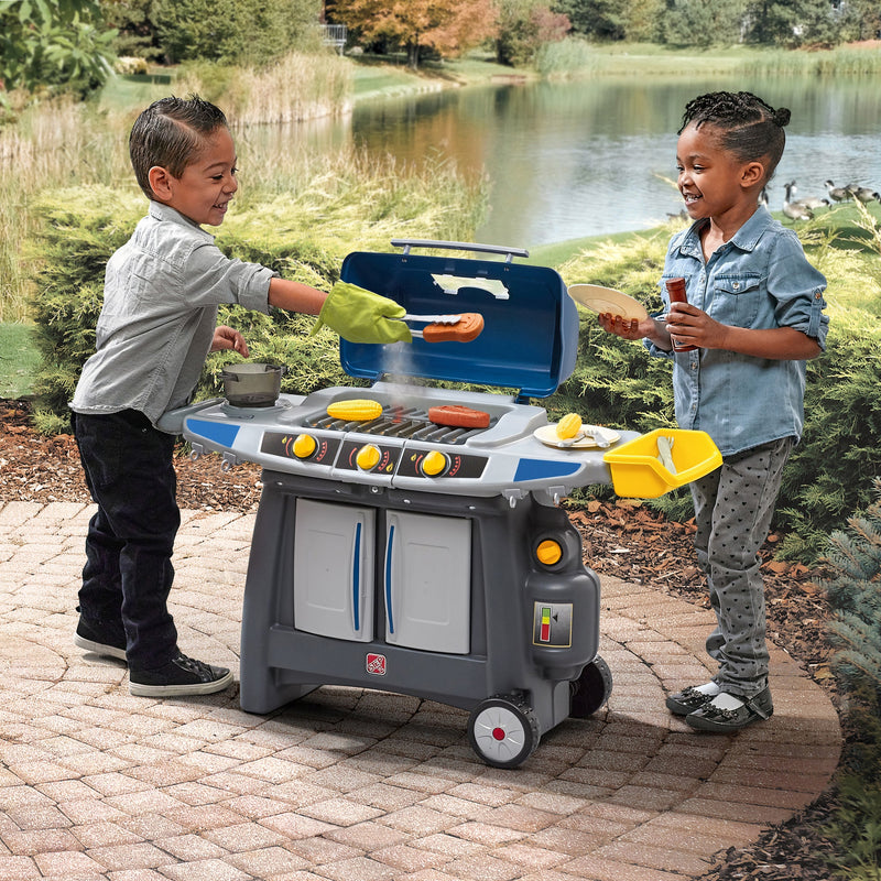 Sizzle & Smoke Barbeque Grill kids grilling on toy grill