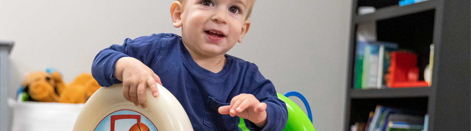 boy on climber slide