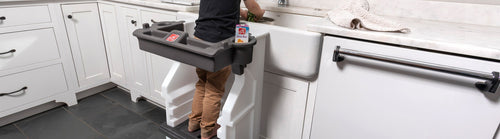 Child on a toddler step stool 