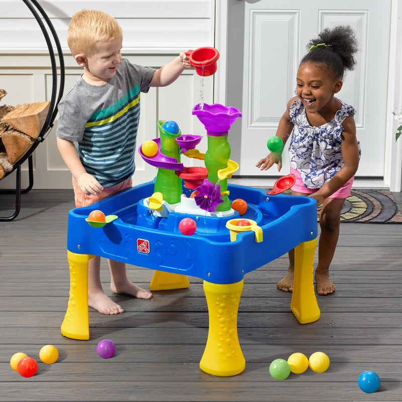 Rise & Fall Water & Ball Table™ with kids playing