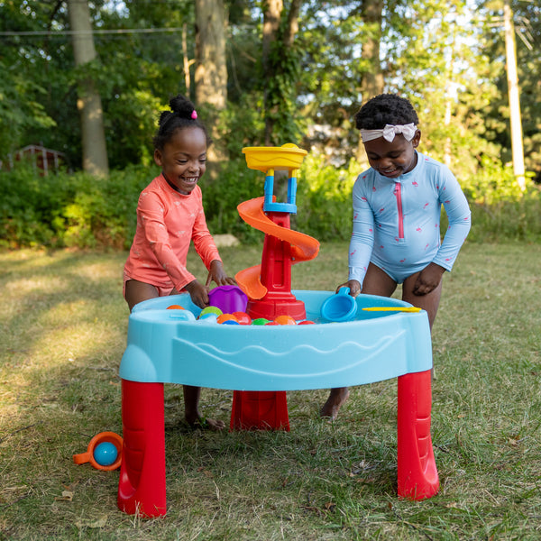 Spiral Slide Water Table™ with children playing