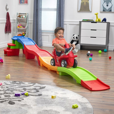 Farther & Faster Coaster Track Expansion Pack Second Edition with boy riding