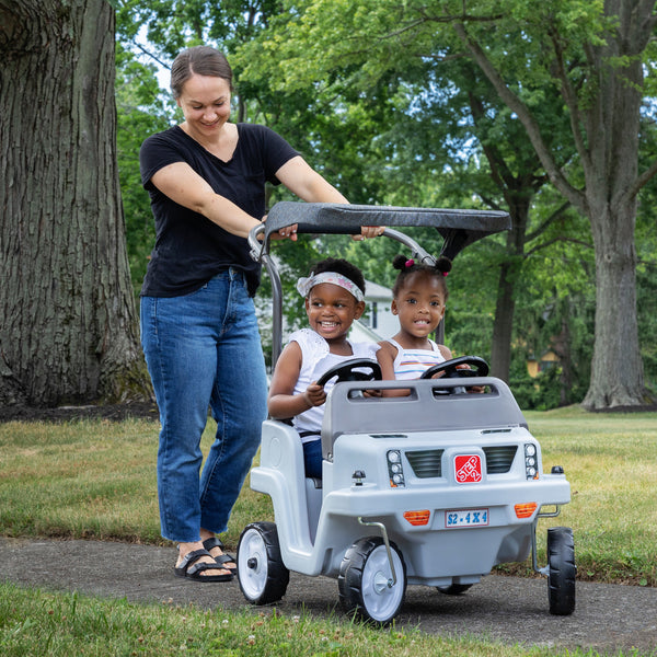 Side-By-Side Push Around SUV™ - Gray with children riding
