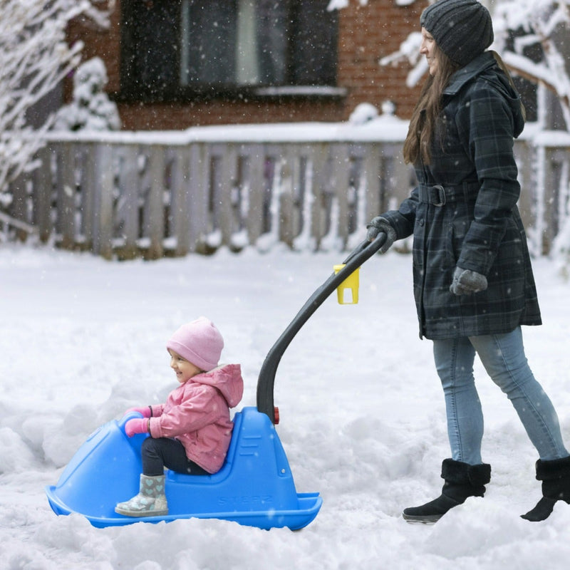 Push Around Snow Sled women pushing child