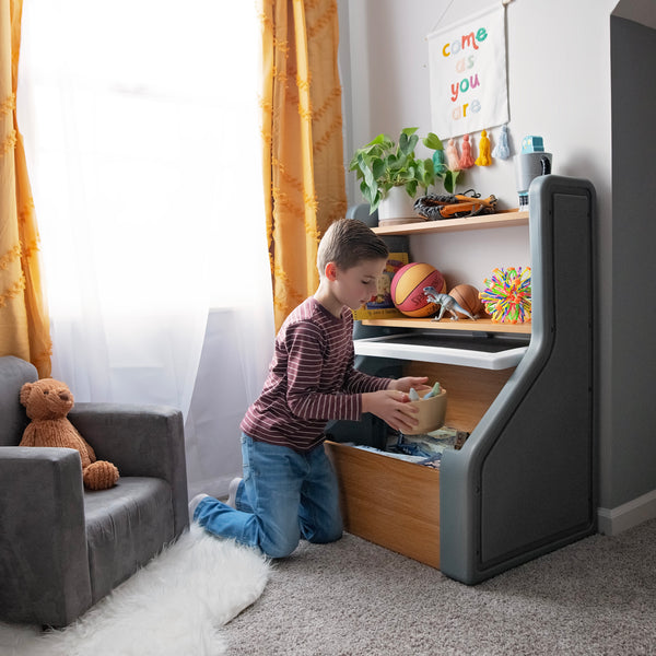 Harmony Toy Storage Box™ boy putting toys away