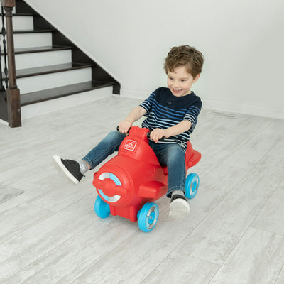 Sky Rider Foot-to-Floor Ride-On with child  riding indoors