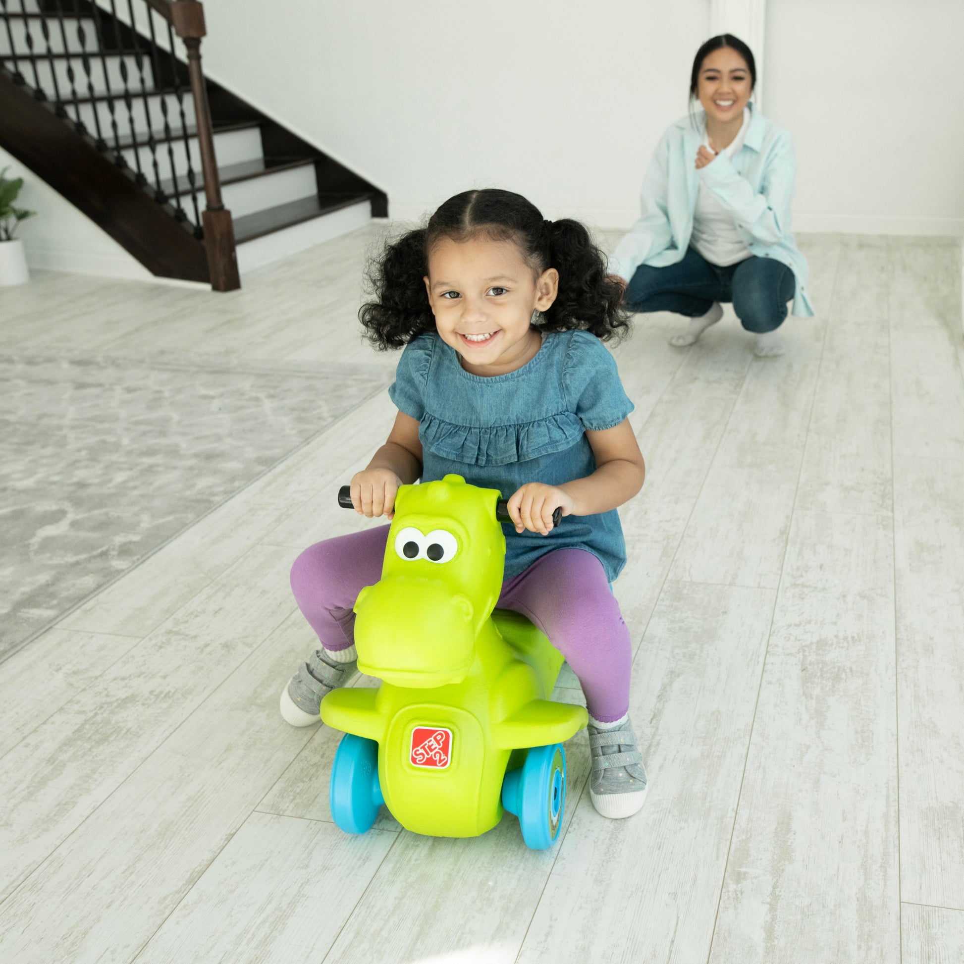 Dino Dash Foot-to-Floor Ride-On with child riding