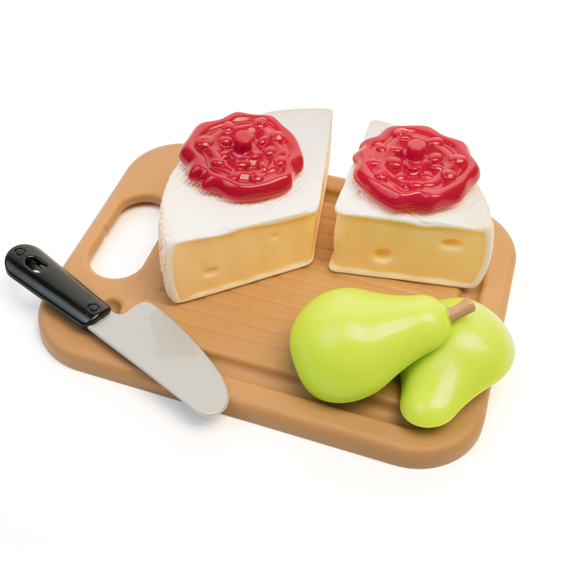Toy charcuterie accessories — two cheese wedges with red jam toppers, toy knife, and two interlocking pear halves on wood-texture cutting board; white background