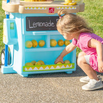 My First Lemonade Stand™ storage underneath chalkboard
