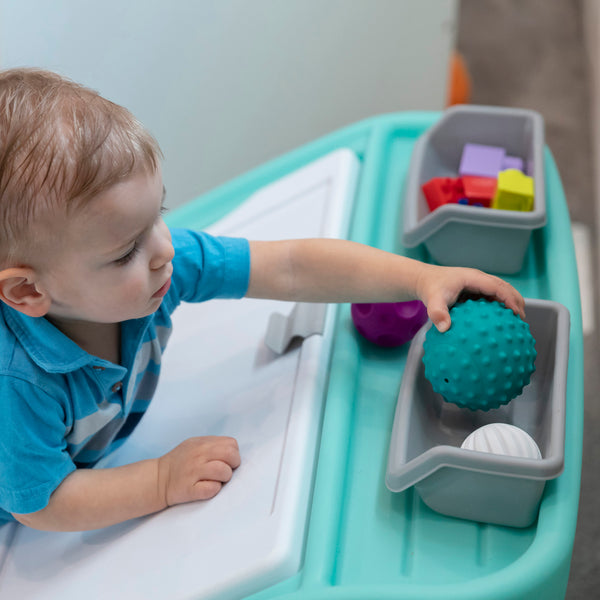 2-in-1 Toy Box & Art Lid™  child using storage bins