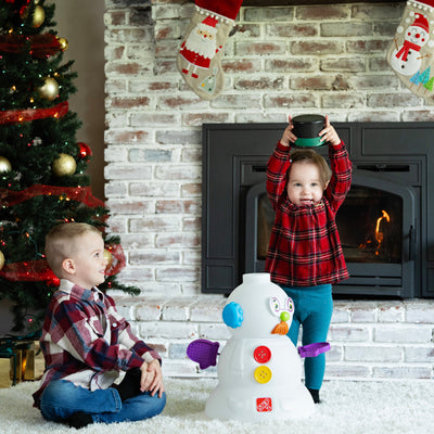 My First Snowman™ children playing with snowman