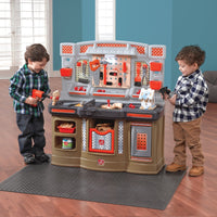 Big Builders Pro Play Workshop Workbench with kids playing