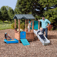 Woodland Adventure Playhouse & Slide with kids playing outdoors