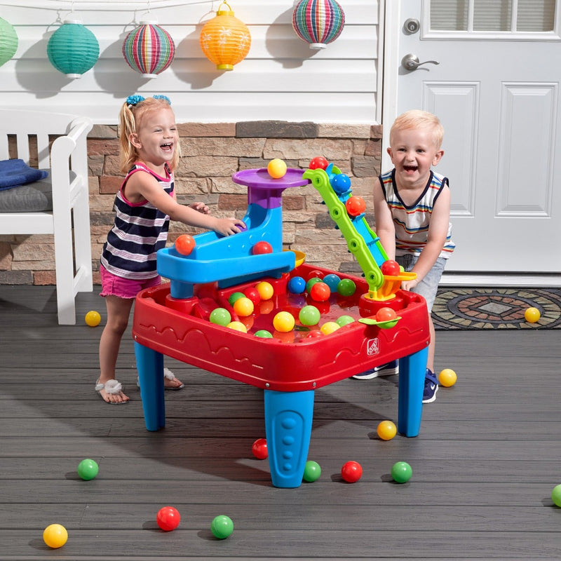 STEM Discovery Ball Table with kids playing