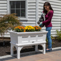 Atherton Raised Planter Box™ - Classic White woman watering flowers