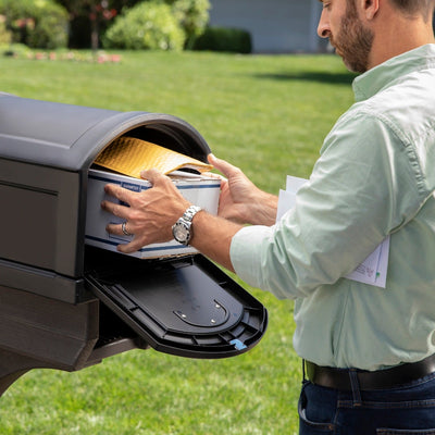 Lakewood XL Mailbox & Post Kit mailbox filled with packages and mail.