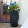 Tremont Tall Square Tapered Planter™ - Onyx Black with flowers