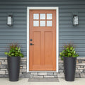 Tremont Tall Round Tapered Planter™ - Onyx Black 2 Pack at entryway