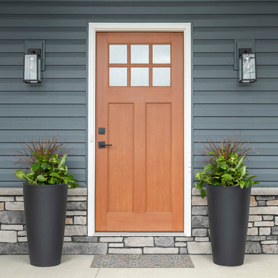 Tremont Tall Round Tapered Planter™ - Onyx Black 2 Pack at entryway
