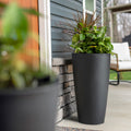 Tremont Tall Round Tapered Planter™ - Onyx Black 2 Pack with foliage