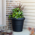 Claremont Planter™ - Onyx Black with foliage