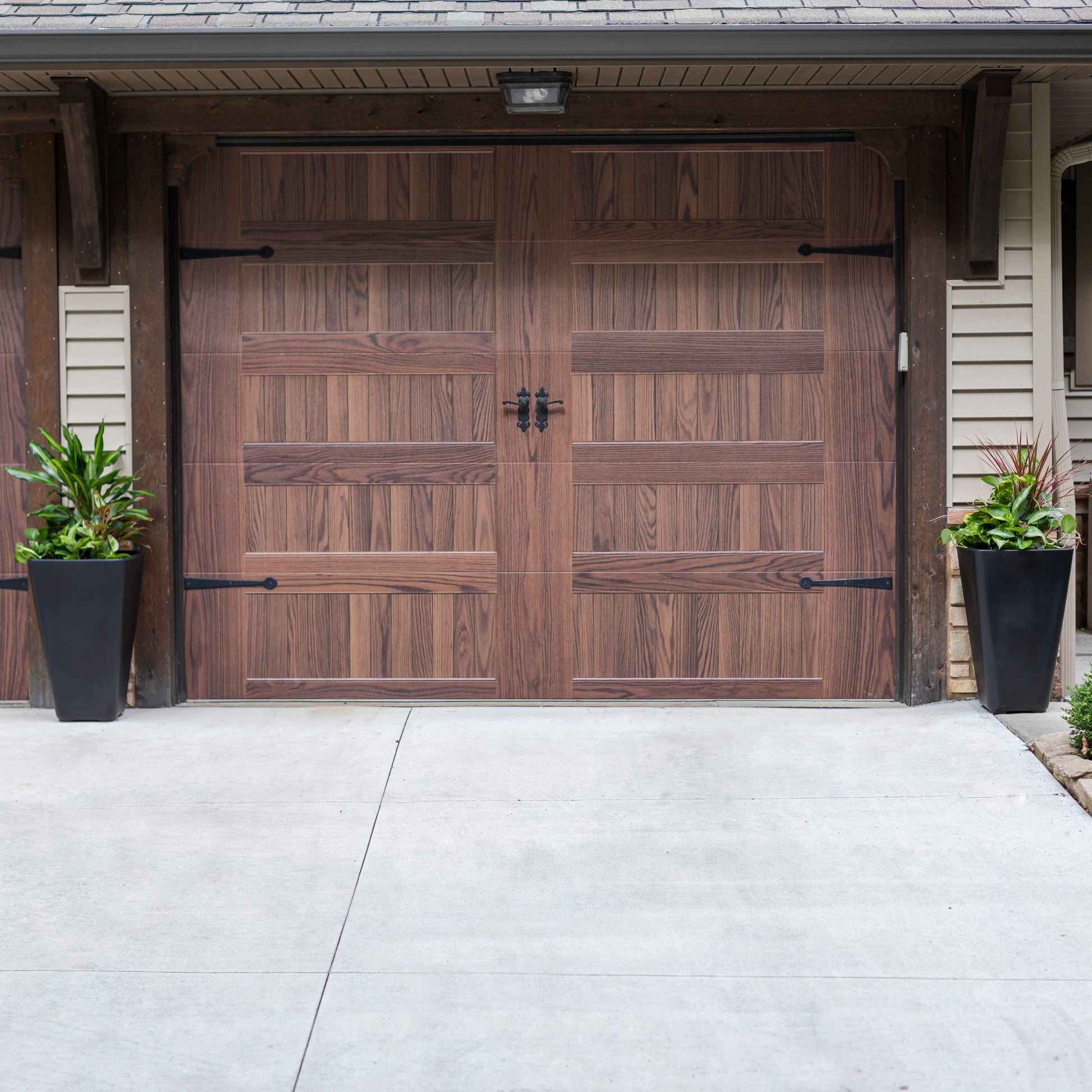 Bridgeview Tall Planter™ - Onyx Black 2 Pack outside garage