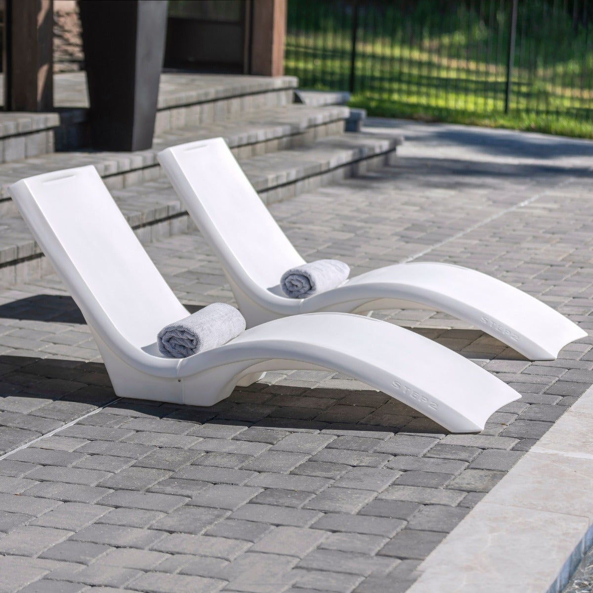 Vero Pool Lounger - White outside of the pool.