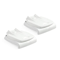Two white Flip Seats folded flat and stacked; white background