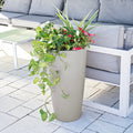 Tremont Tall Round Tapered Planter™ - Concrete Gray with plants