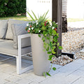 Tremont Tall Round Tapered Planter™ - Concrete Gray on patio