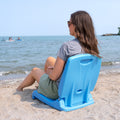 Flip Seat™ woman using at beach