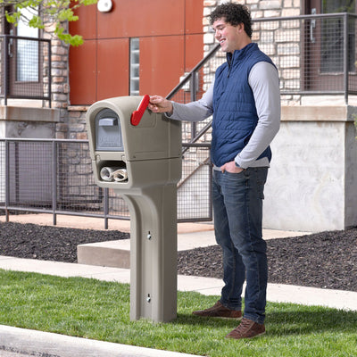 MailMaster Plus Stone Gray man putting flag up on mailbox
