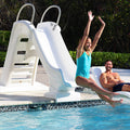 Vero Pool Slide™ with child going down slide
