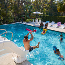 Vero Pool Slide™ with man using slide