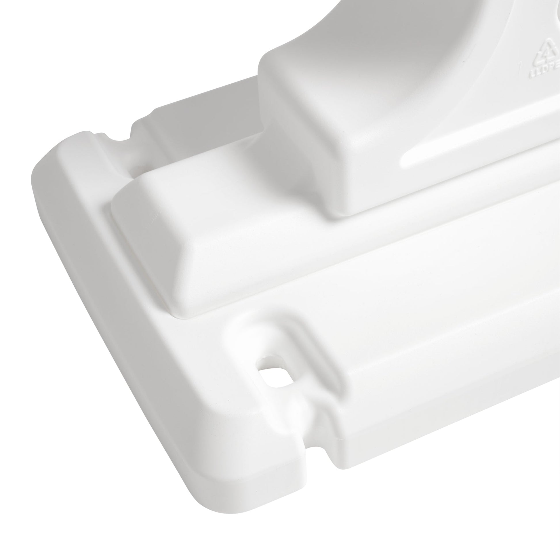 Close-up of the JOY letter base showing the interlocking connector and ground-stake slot detail