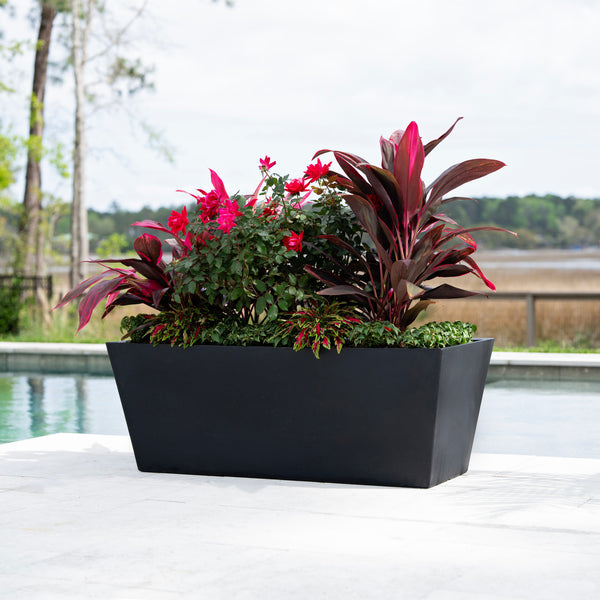 Tremont Trough Planter™ 2 Pack one shown with plants and flowers