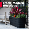 Wave Trough Planter™ 2 Pack - Black single planter shown on patio