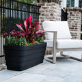 Wave Trough Planter™ 2 Pack one planter shown with plants