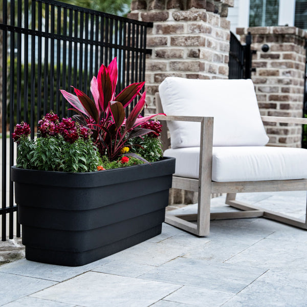 Wave Trough Planter™ 2 Pack one planter shown with plants
