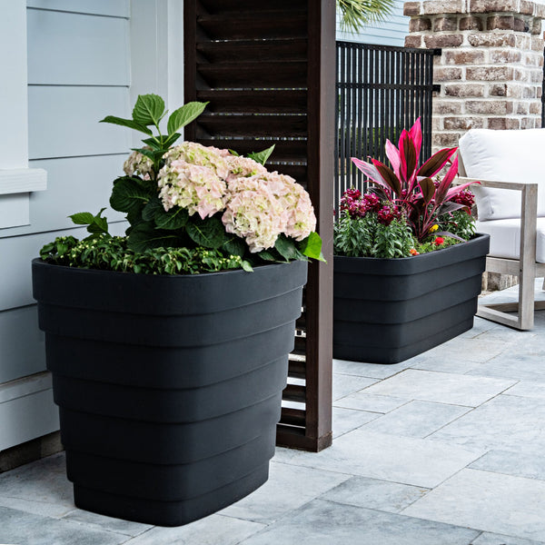 Wave Trough Planter™ 2 Pack - Black shown with foliage