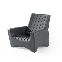 SwitchBack Chair in dark slate — high-back molded chair with vertical slat backrest, wide armrests, and arched base; 3/4 front view; white background
