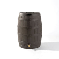 Step2 American Oak Rain Barrel — dark brown oak-texture barrel with stave plank detail, horizontal bands, black lid, and brass spigot at base, on white background