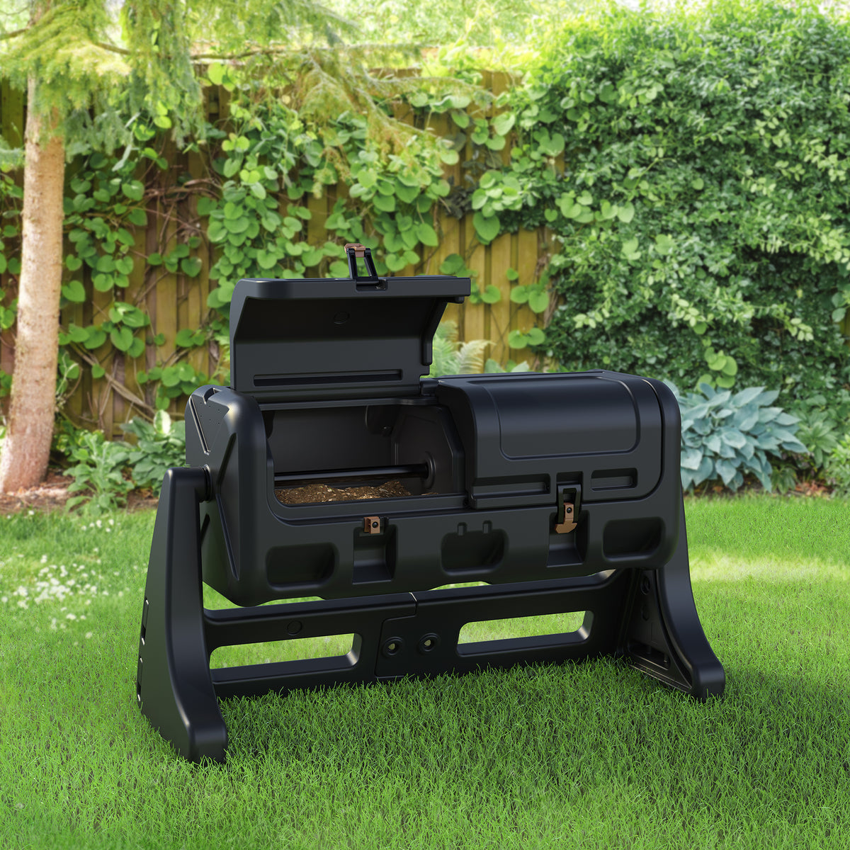 Step2 EverTough 58-Gallon Tumbling Composter — one chamber open with dark compost, set in lush garden