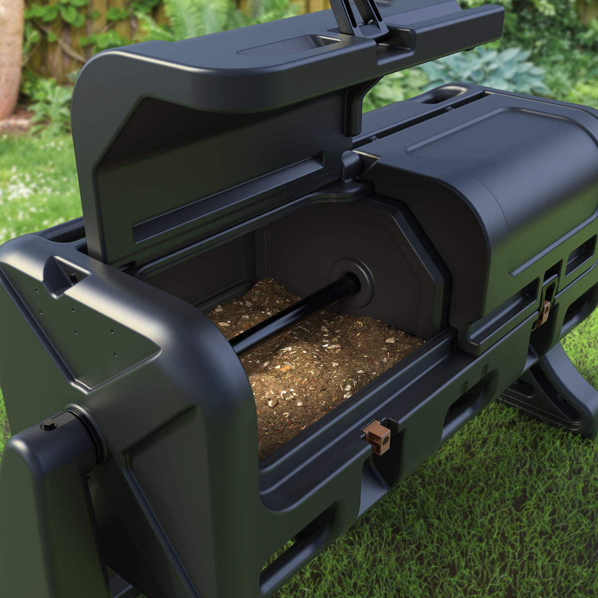 Close-up of EverTough Composter interior chamber showing compost material and axle rod