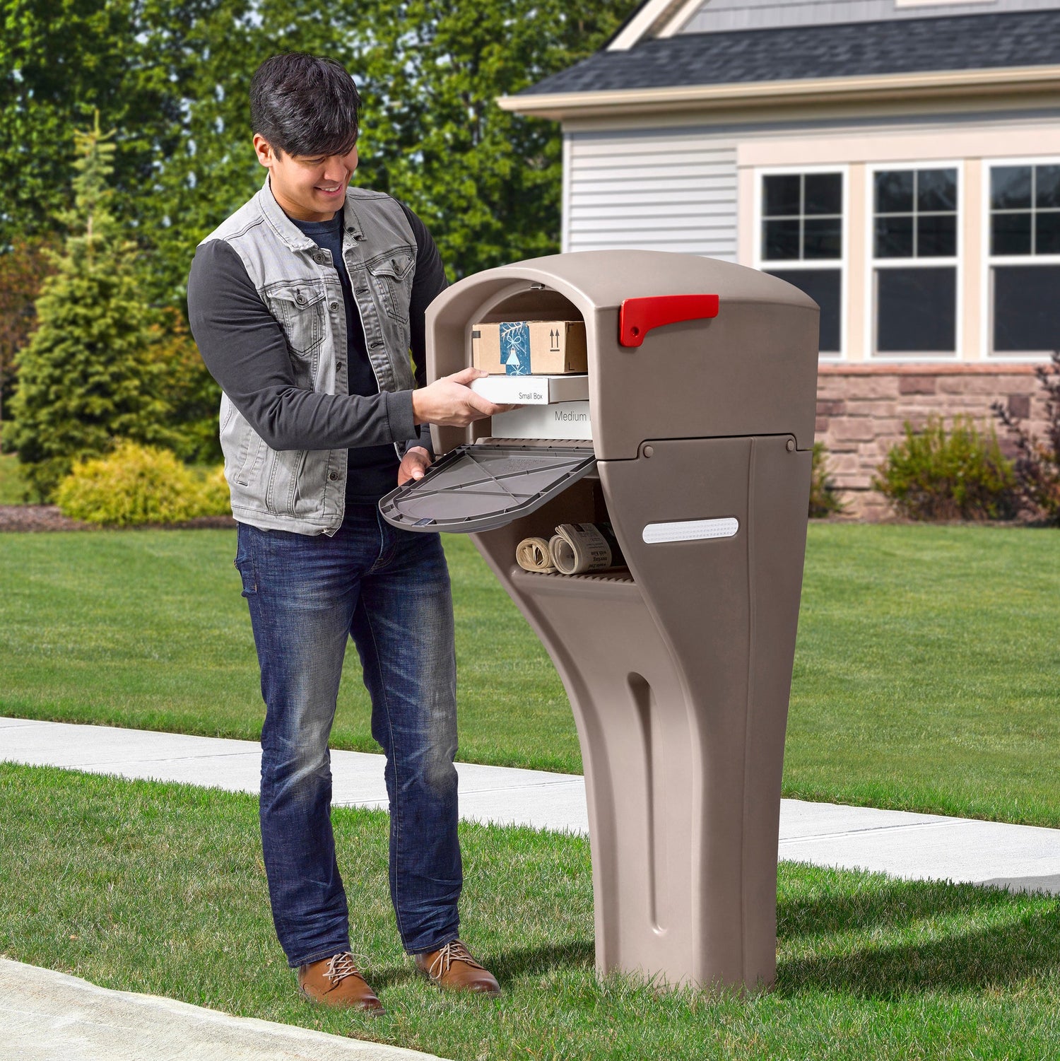 Mailmaster Xl Mailbox Mocha retrieving mail from front of unit 