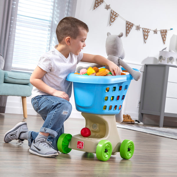 Little Helper's Shopping Cart™ - Blue child putting items in basket