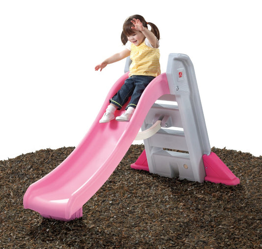Naturally Playful™ Big Folding Slide™ - Pink with girl sliding.
