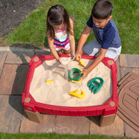 Naturally Playful™ Sand Table™ kids playing in sand