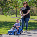 Push Around Buggy GT™ - Blue with child being pushed in buggy
