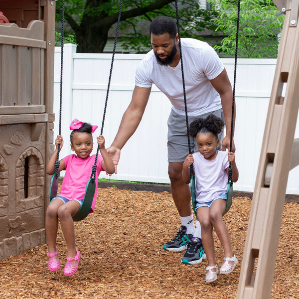 Naturally Playful™ Adventure Lodge Play Center with Glider kids playing